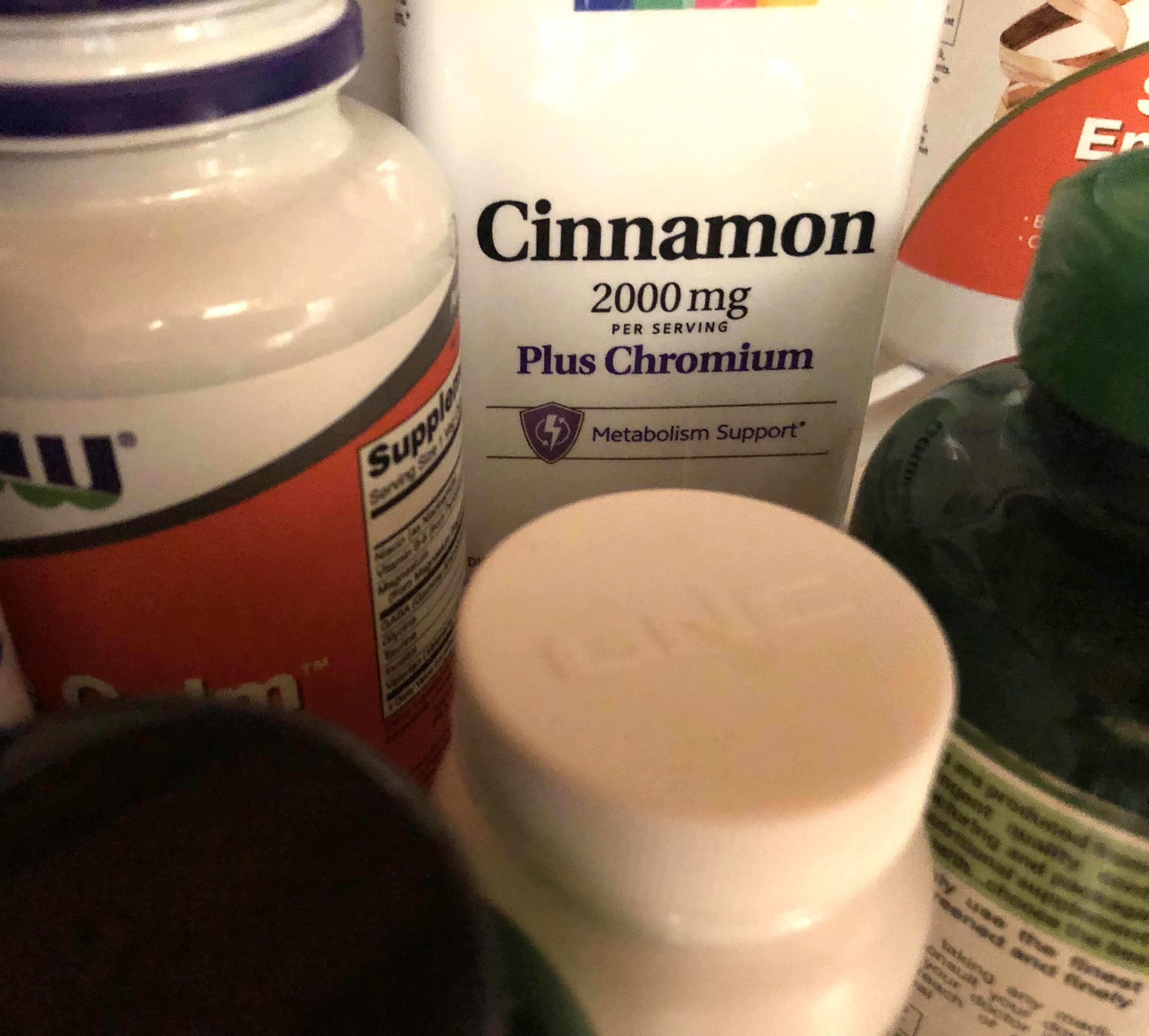 Cinnamon Capsules Nested Among Other Supplements